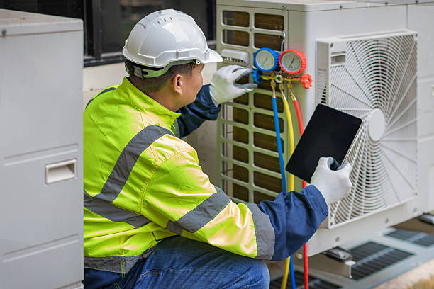 Professional Ac Installation technician working in Pettigrew, AR